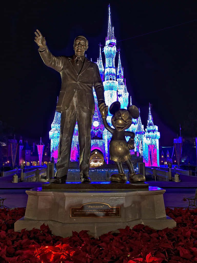 Disney World Partners statue iPhone wallpaper with bronze Walt Disney Mickey Mouse and Cinderella Castle