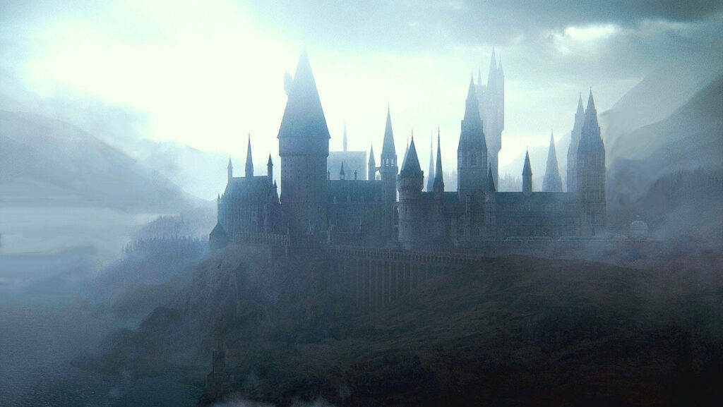 Hogwarts in Ethereal Mist: Magical Desktop Wallpaper Background
