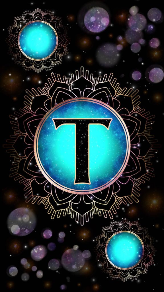 Bold glowing Letter T in blue nebula with gold mandala on black celestial background wallpaper