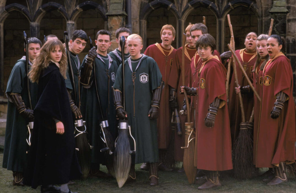 Harry Potter Quidditch teams Gryffindor and Slytherin with Harry Draco Hermione Hogwarts wallpaper