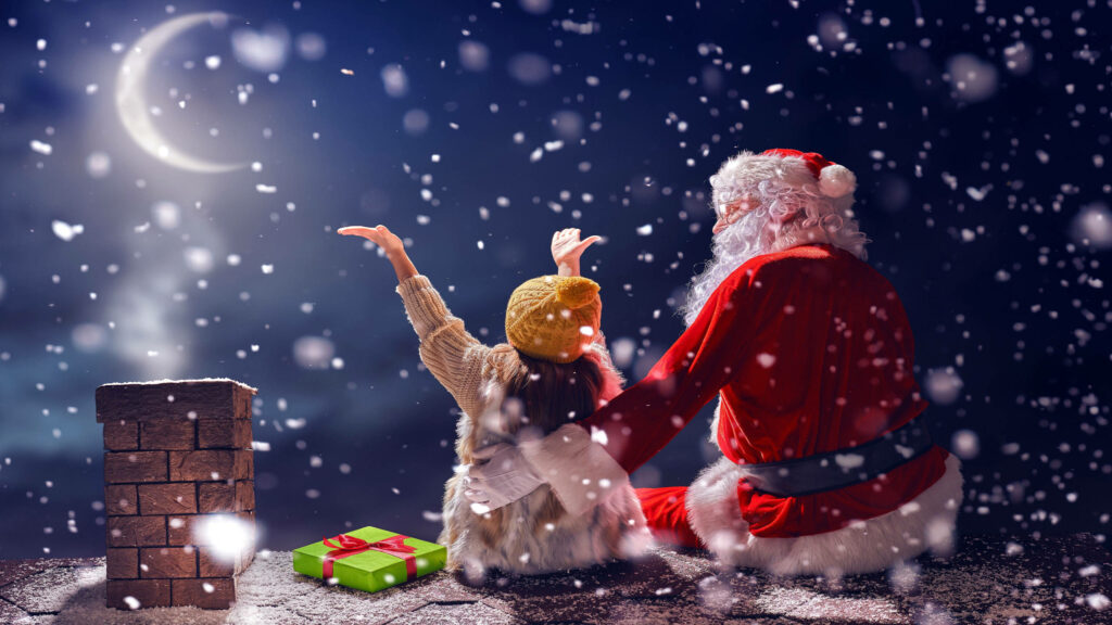 Magical Santa and Girl on Snowy Rooftop Festive Wallpaper
