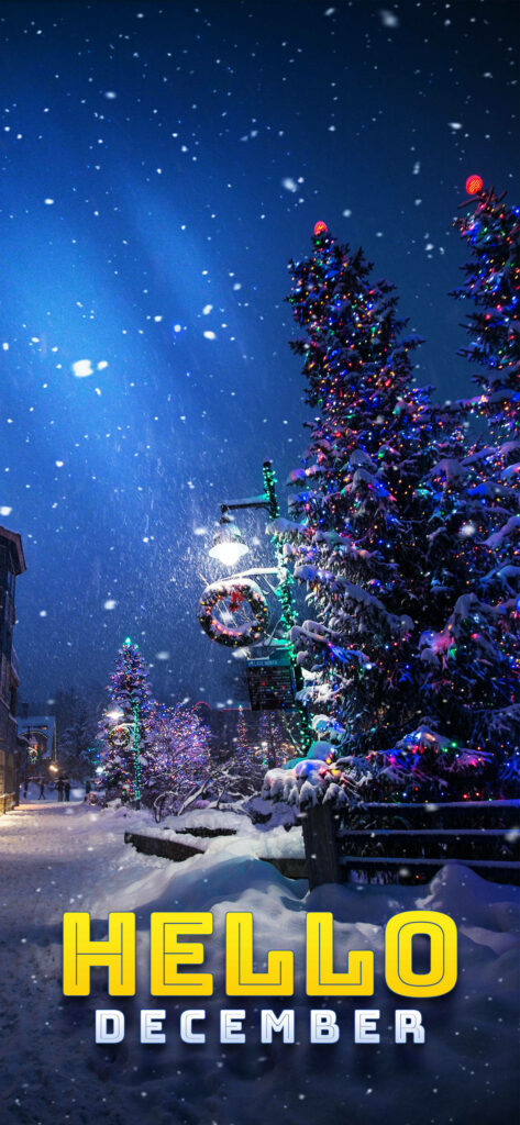 Magical snowy Christmas Eve with decorated trees festive lights Hello December winter wallpaper background