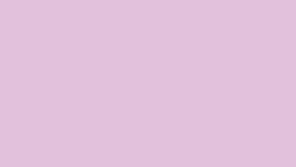 Dreamy Delight: Mauve Murmurs of Serenity in Solid Pink Wallpaper