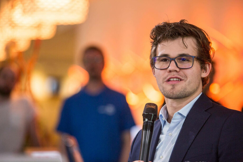 Magnus Carlsen: Inspired Wallpaper of the Chess Champion in Action