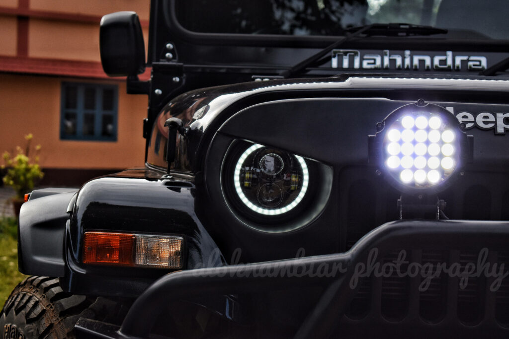 Front view Mahindra Thar Jeep 4K wallpaper with powerful LED spotlight and rugged headlights