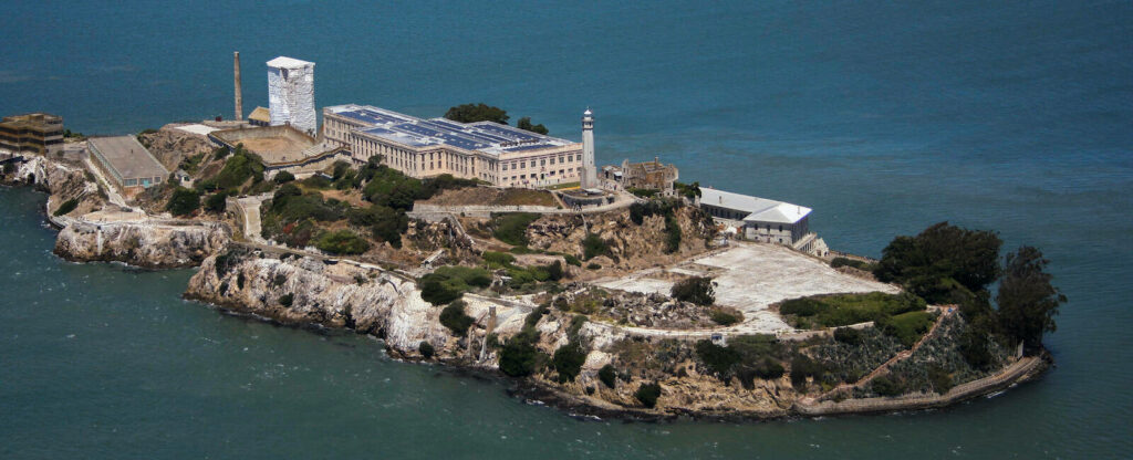 Alcatraz Island: Dominating Presence Amidst Vast Oceanic Setting Wallpaper