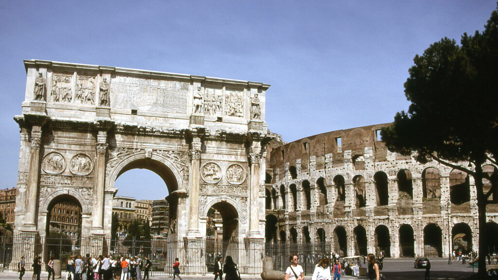Arch of Constantine and Colosseum under clear sky showcasing ancient Roman architecture wallpaper