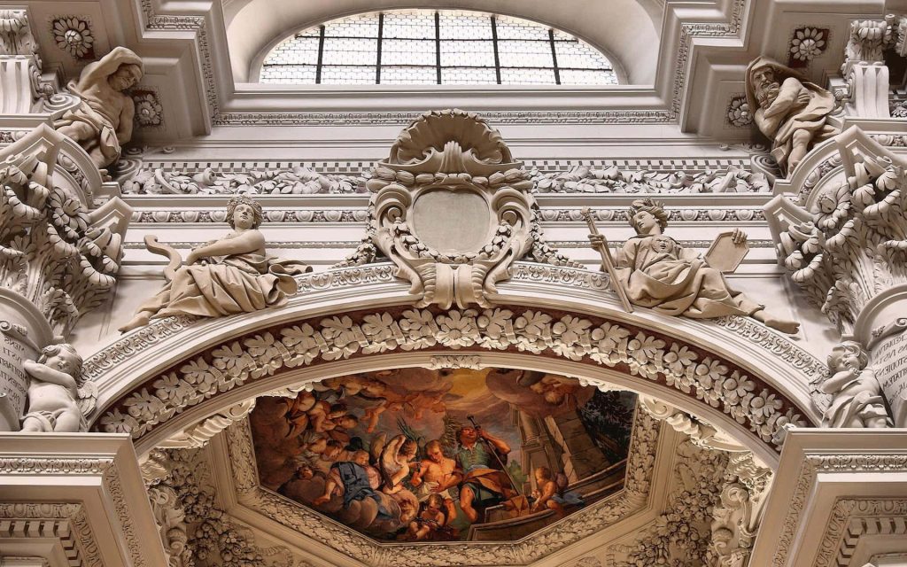 Baroque architecture with ornate ivory stucco statues and vibrant classical fresco interior wallpaper