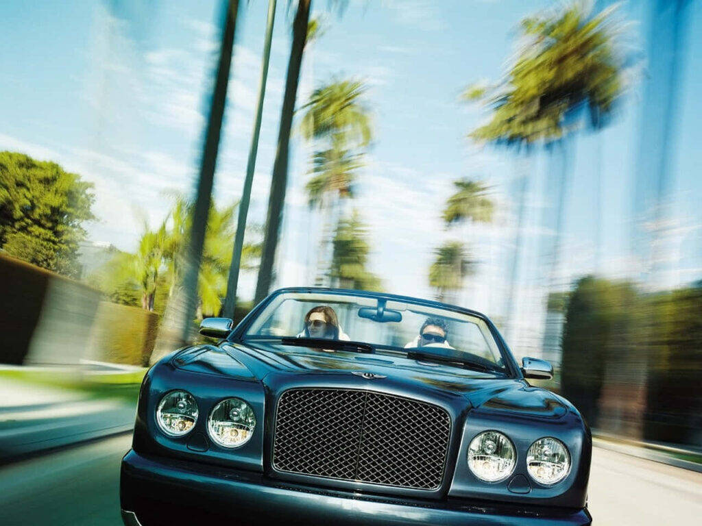 Bentley Azure Gracing the Road Wallpaper