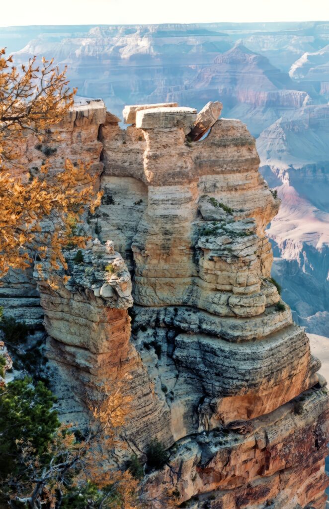 Majestic canyon landscape with rugged rock formations earthy tones and dramatic natural shadows Wallpaper