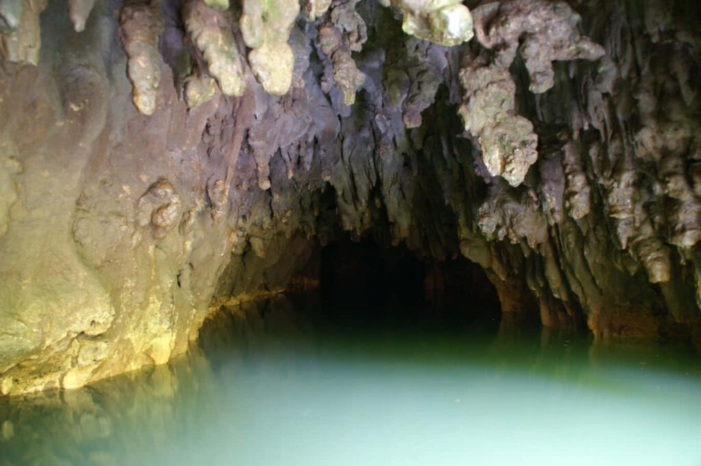 Majestic Cave Interior Wallpaper: Stunning Stalactites & Serenity