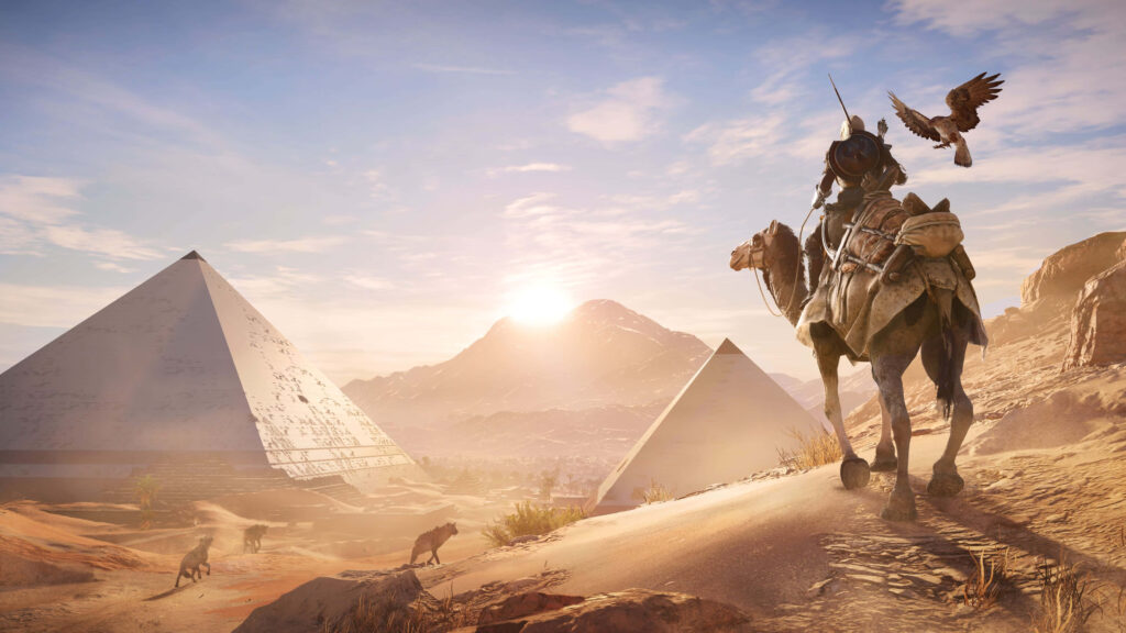 Desert landscape with golden sands pyramids mountains camel rider and soaring eagle under bright sky Wallpaper