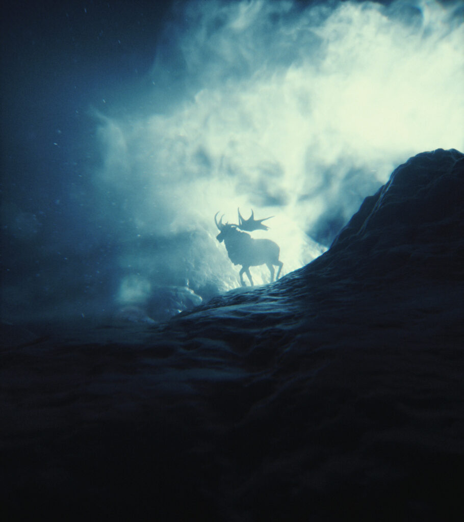 Majestic Elk Silhouette Against Dramatic Mountain Background Wallpaper