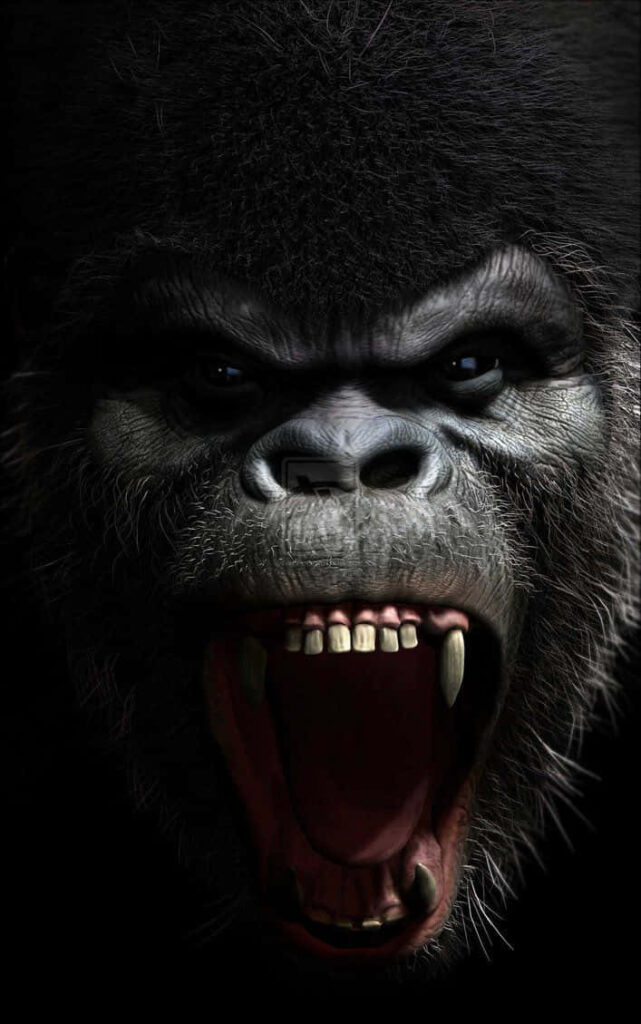 Majestic Gorilla Wallpaper: Powerful Presence Against Dark Background