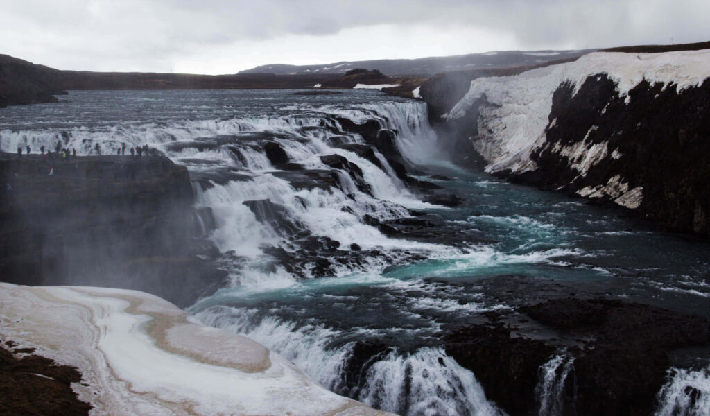 Majestic Gullfoss Waterfall Wallpaper: Dramatic Icelandic Landscape