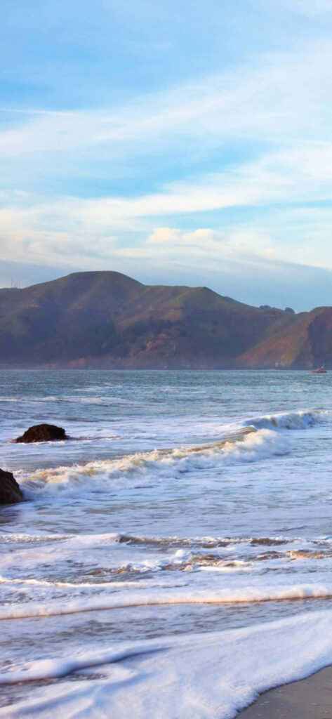 Paradise Found: Soak up Malibu's Enchanting Beachfront Beauty with your Ultimate Summer Escape Wallpaper