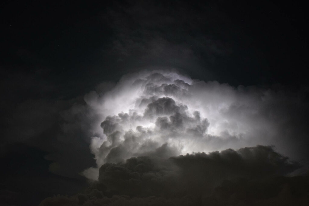 Intense Lightning Illuminating Foreboding Dark Storm Clouds - HD Background Image Wallpaper
