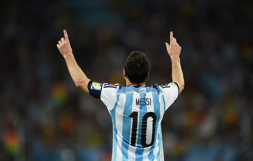 The Divine Moment: Lionel Messi's Majestic Gesture Captivates the Crowd - Mesmerizing 4K Ultra HD Soccer Wallpaper