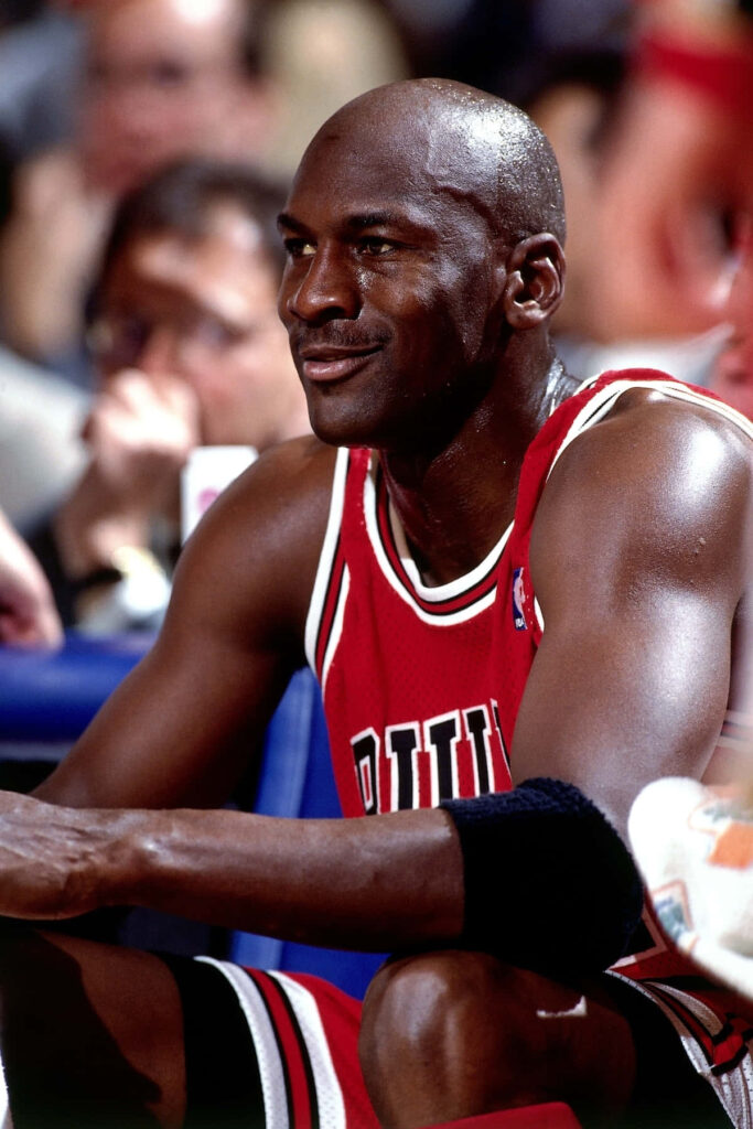 Airborne Glory: Michael Jordan's Monumental Hoopdom with the Chicago Bulls Wallpaper