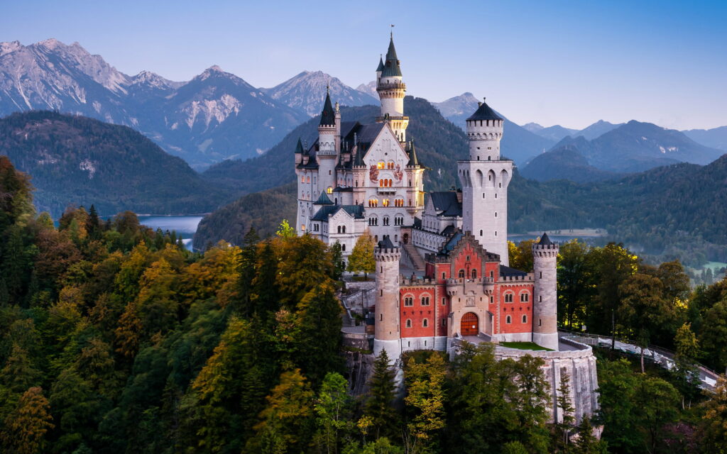 Fairytale Majesty: Neuschwanstein Castle in Bavarian Evening Wallpaper