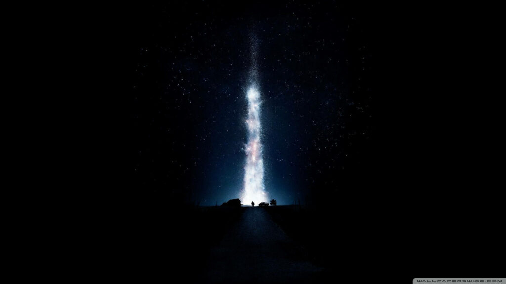 Interstellar Stardust: A Spectacular Celestial Collision in the Night Sky Wallpaper