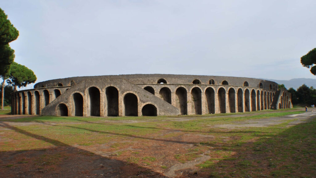 Majestic Pompeii Amphitheater Wallpaper: Historic Charm & Grand Arches