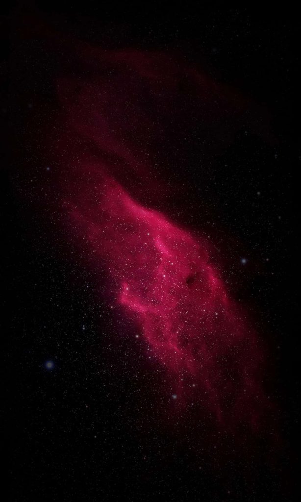 Glowing red nebula with stars on black space background iPhone wallpaper for cosmic aesthetics