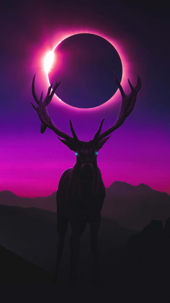 Majestic Reindeer in Surreal Winter Eclipse Wallpaper Background