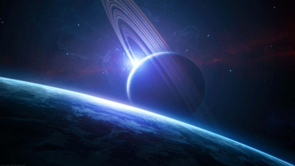 Majestic ringed planet glowing with stellar backlight over detailed cosmic horizon wallpaper