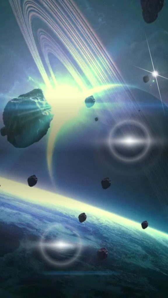 Majestic ringed planet with glowing atmosphere meteorites and ethereal lens flares in space wallpaper