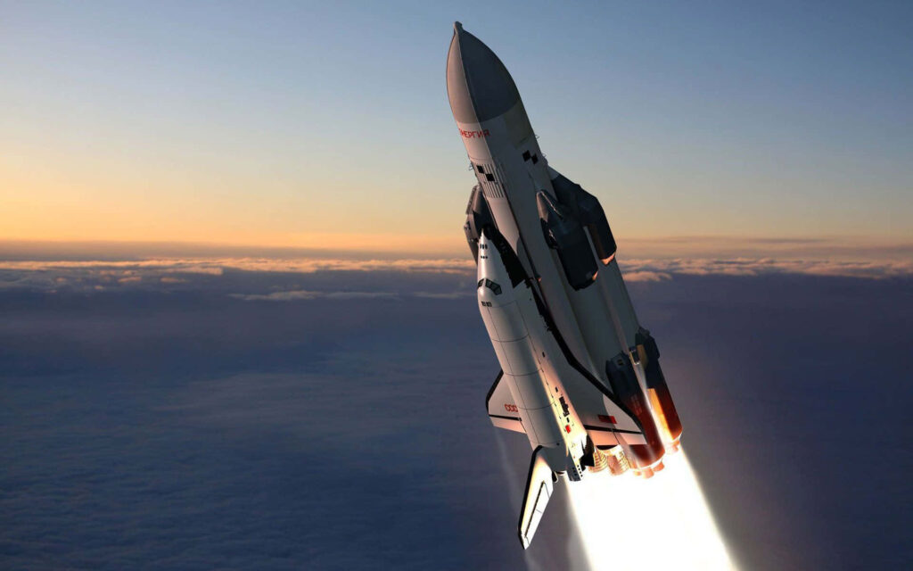 Majestic Space Shuttle Wallpaper: Sunset Clouds Background