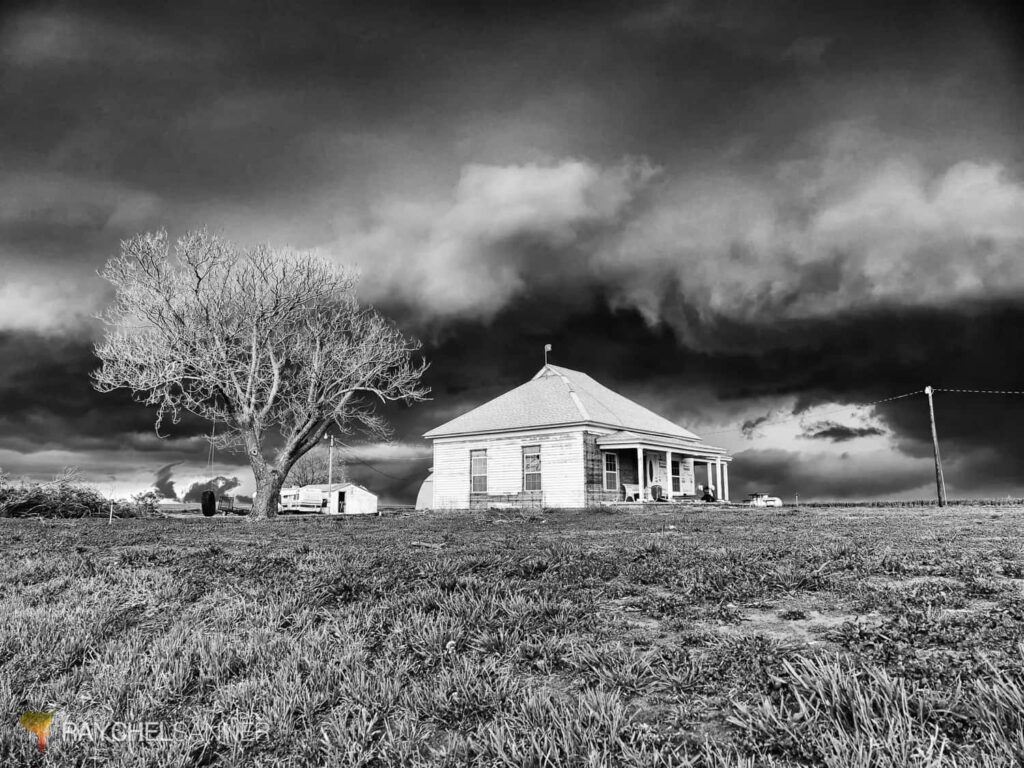 Stormy Black and White Wallpaper: Majestic Scene with Isolated House