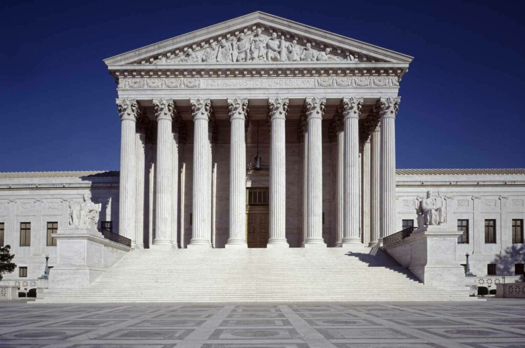 Majestic Supreme Court Wallpaper: Grand Columns & Justice Symbol