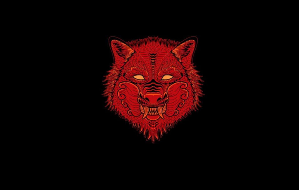 Majestic Wolf Head Wallpaper: Intricate Red Patterns on Black Background