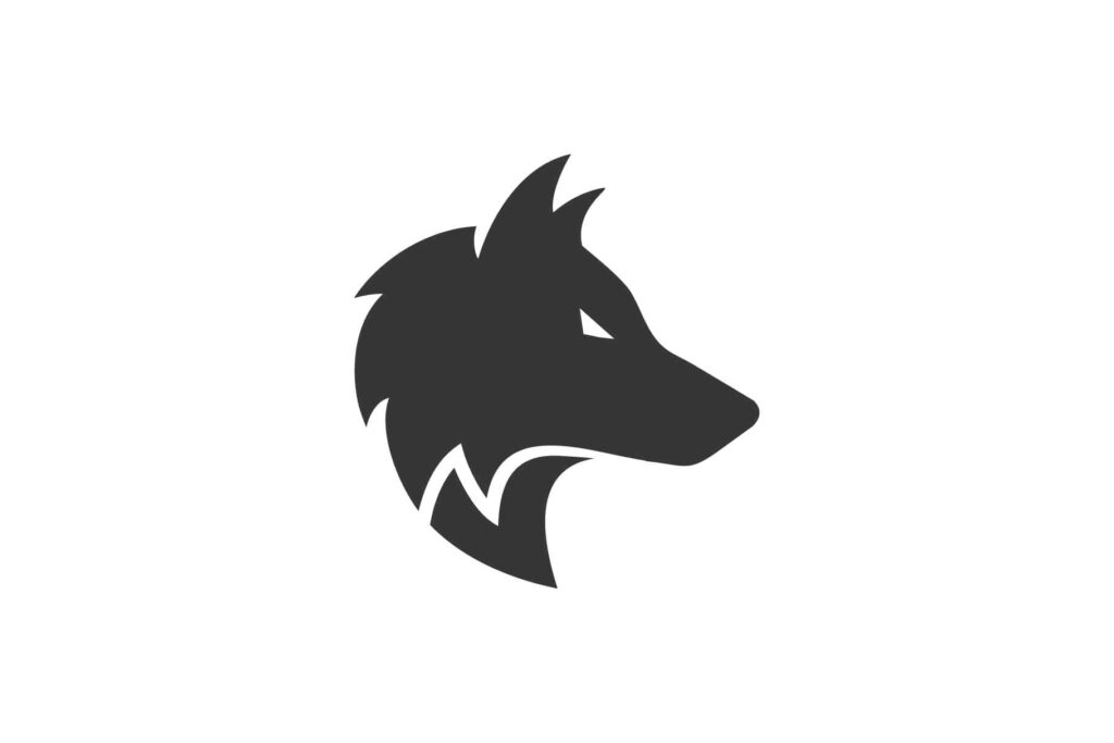 Majestic Wolf Silhouette Against Vibrant Sky Wallpaper