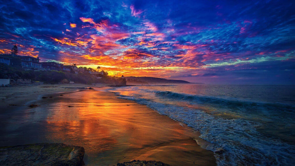 Majestic Sunrise Casting a Spell on Malibu's Azure Sky: Desktop Wallpaper Bliss