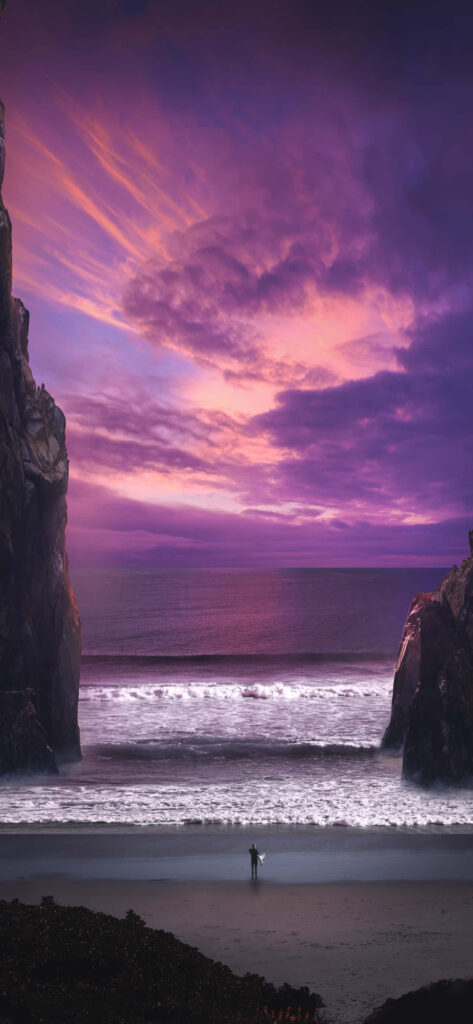 Malibu Sunset: A Serene Seascape Painted in Dramatic Purple Hues Wallpaper