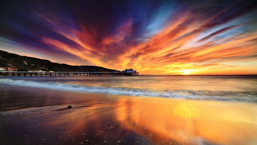 Majestic Malibu: A Vibrant Sky Canvas in Crystal Clear Resolution Wallpaper