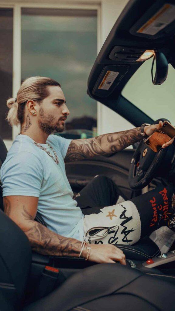 Maluma driving luxury Ferrari stylish dynamic wallpaper background rapper singer car ride