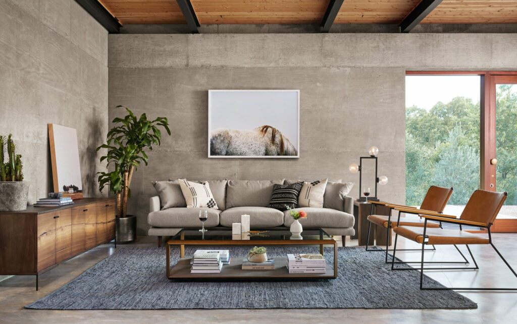 Modern Comfort: A Captivating HD Wallpaper of a Sophisticated Living Room with a Stylish Sofa
