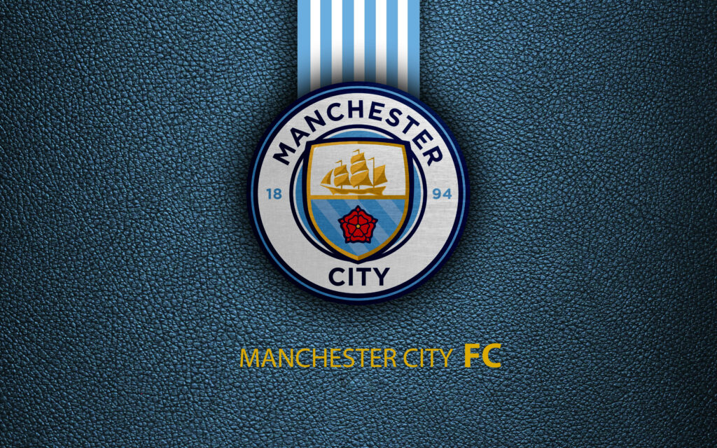 Manchester City FC logo on textured dark background with vertical blue white stripes and club name Wallpaper
