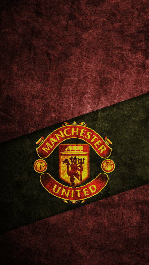 Manchester United crest on textured red and green background bold football wallpaper design