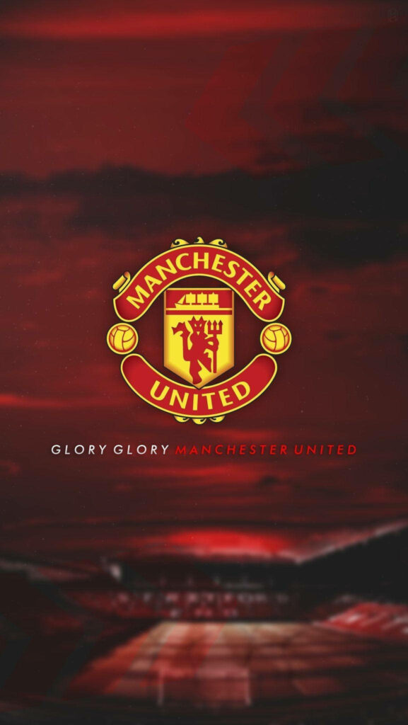 Manchester United emblem on fiery background showcasing passion and energy of the club wallpaper