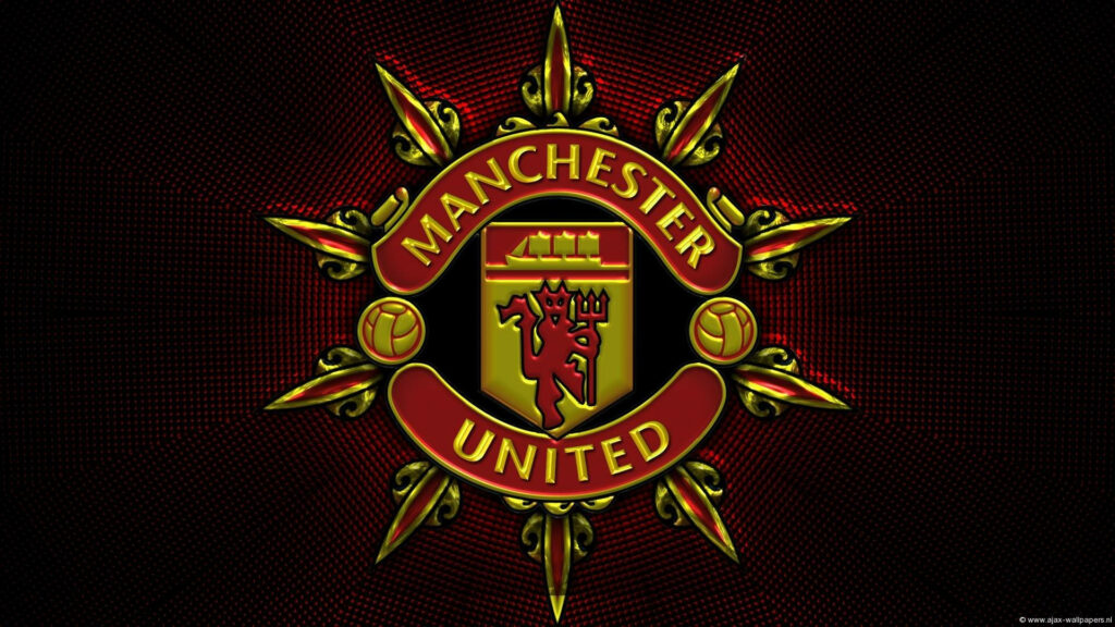 Manchester United logo ornate gold design on dark detailed background wallpaper background