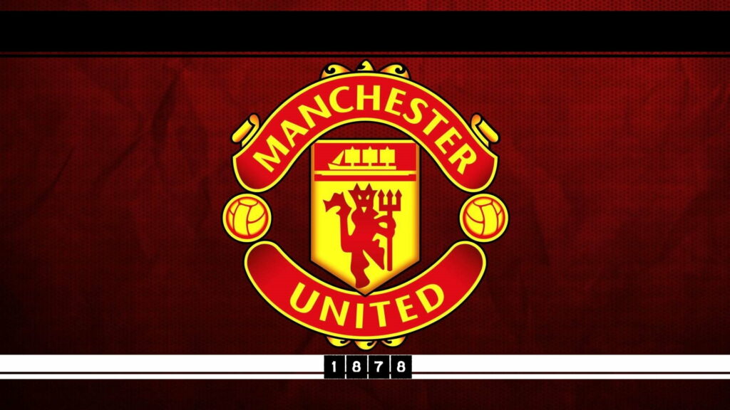 Iconic Emblem: Celebrating England's Leading Soccer Club - Manchester United Logo in Brilliant HD Wallpaper Background