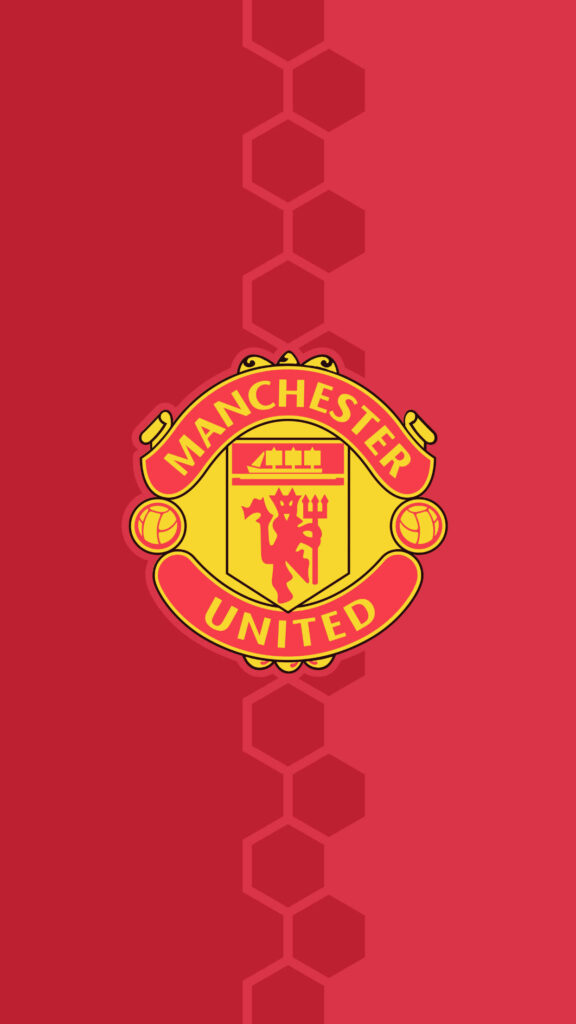 Manchester United logo on vibrant red hexagon pattern background bold football fan wallpaper