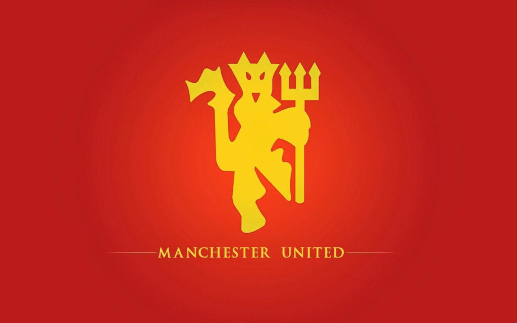 Bold Manchester United logo on dark background showcasing iconic colors and powerful presence Wallpaper