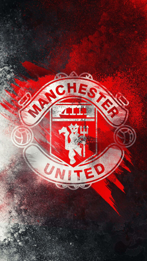 Manchester United logo on dynamic red and black paint texture abstract wallpaper background