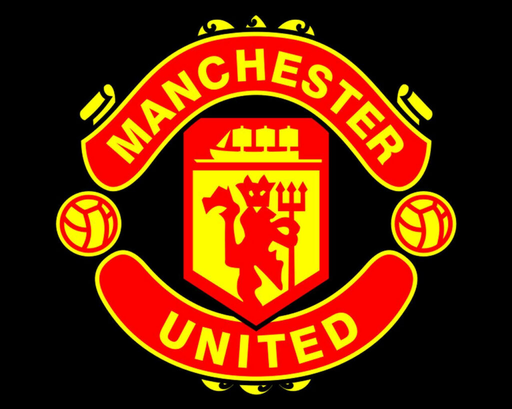 Manchester United logo wallpaper bold red and yellow on black background football club pride