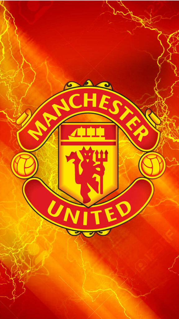 Manchester United wallpaper with bold club crest on red yellow background and lightning accents